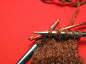 800px-Knitting_dropped_stitch_6